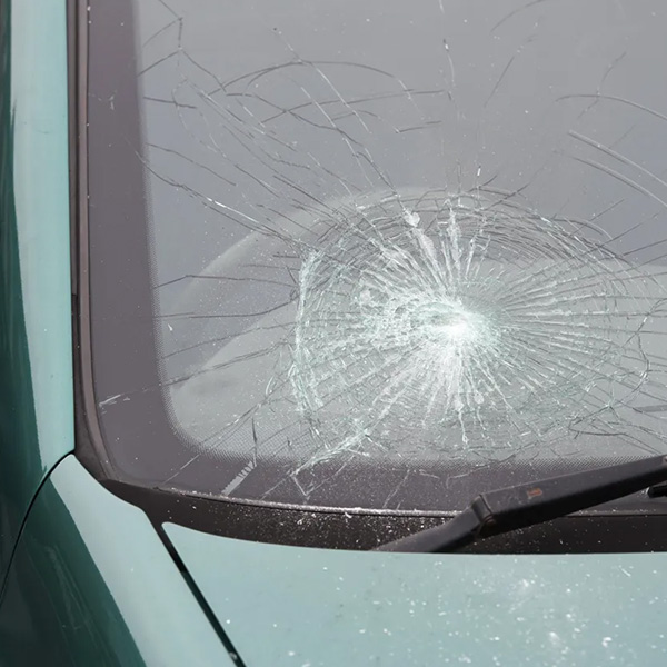 Broken windshield from one side