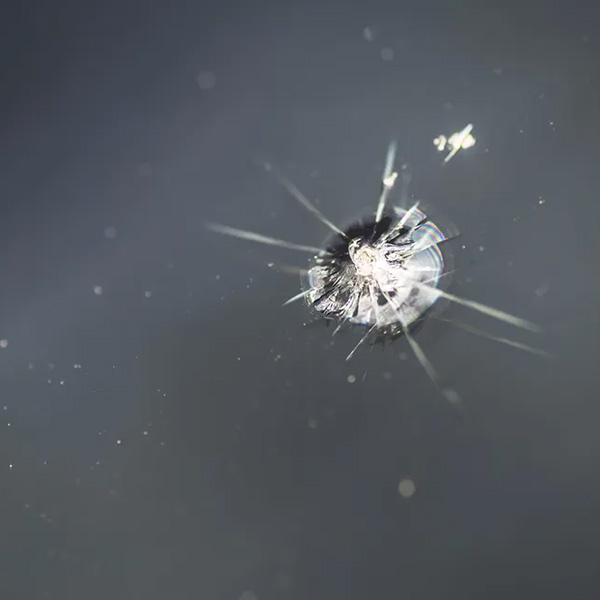 Macro shot of a rock chip on the windshield